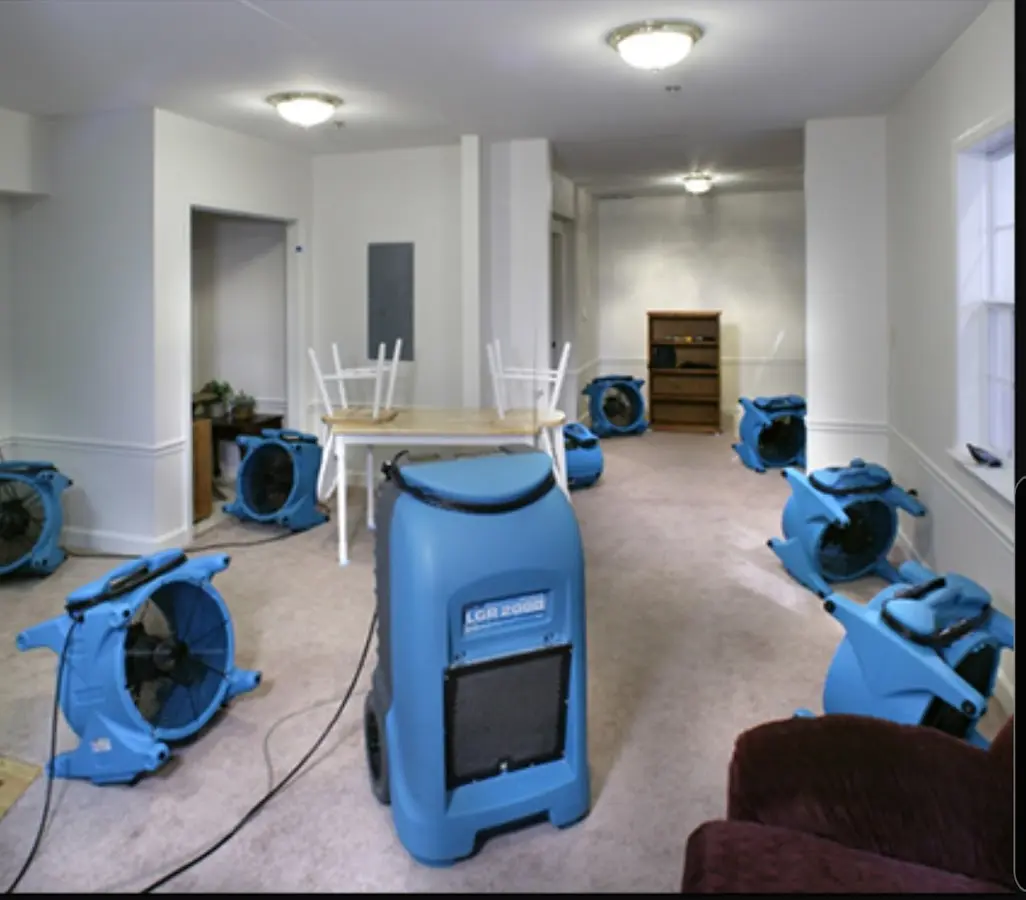 Air movers and dehumidifier setup for Water Damage Restoration in St. Johns